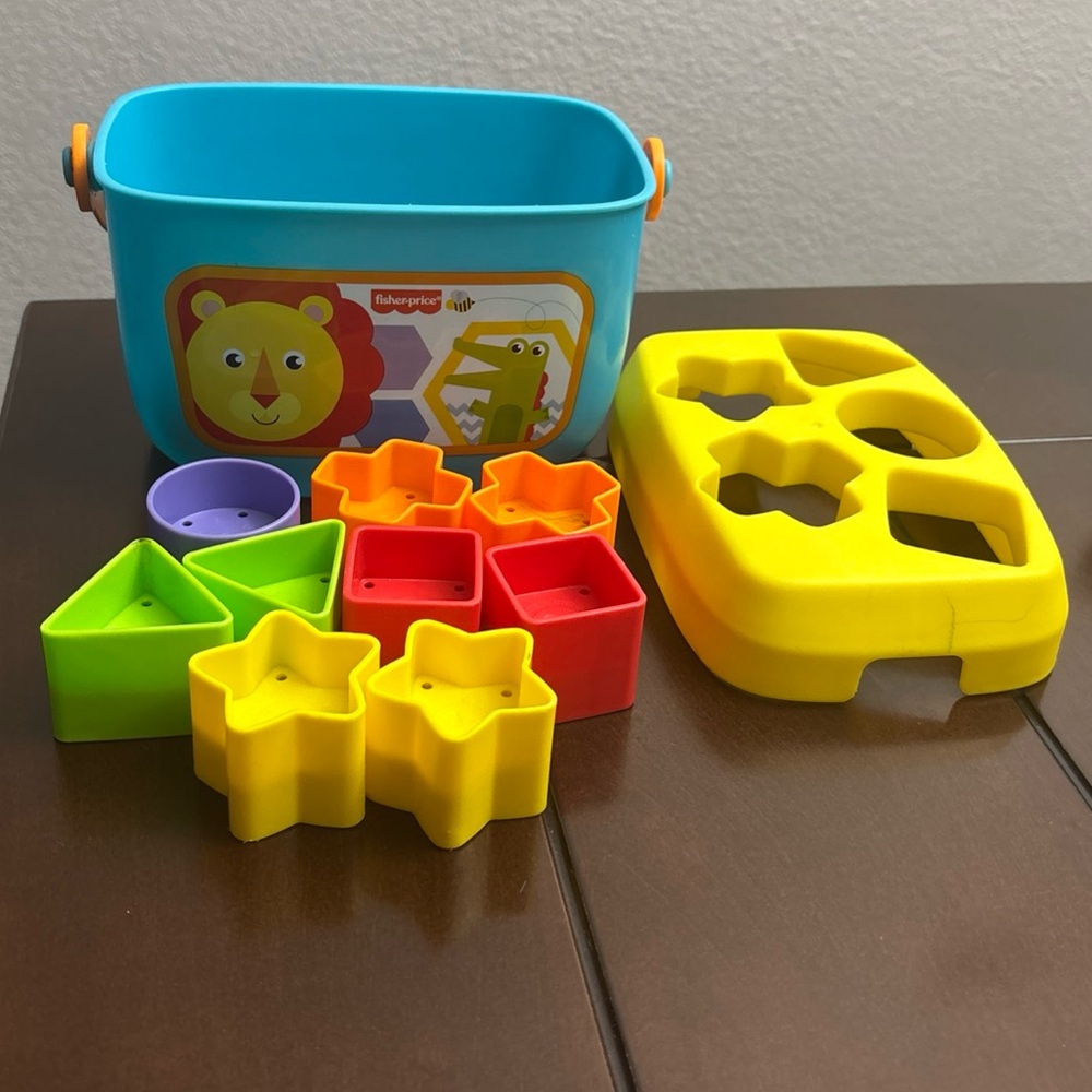 Fisher-Price Blue Storage Bin with Yellow Shape Sorter and Multicolor Blocks